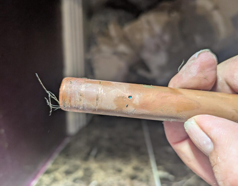Pinhole defect identified in a concealed copper mains-water pipe